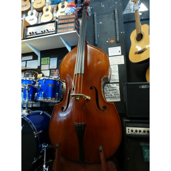 <p>Lovely all-solid 3/4 size double bass.&nbsp; Made in Reghin.</p><p>Condition: This had a crack from the left f hole down to the bottom of the table.&nbsp; It has been very nicely repaired with cleats fitted, and set up with quality strings (Thomastik Spirocore).&nbsp; There are various small marks on the body, but nothing major.</p><p>We also have available a high quality double bass stand for an additional &pound;120 if required.</p><p>Grab yourself a great double bass!</p>