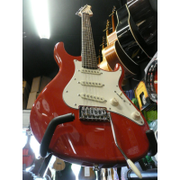 Quality strat copy with powersound pickups, smooth satin neck, beveled neck heel, and lovely scarlet red finish.