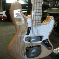 Superb jazz bass copy with ash body, canadian hard maple neck, ash tray bridge cover, and more!