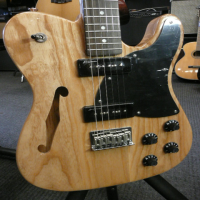 A very attractive natural thinline tele with semi-hollow design, ash body, 2 x P90 pickups, and more!