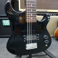 Entry-level electric guitar in good condition.
