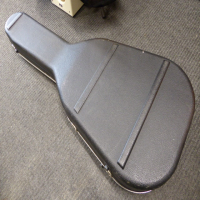 Robust acoustic guitar hard case.