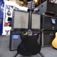 <p>Entry-level SG copy with bolt-on neck.</p><p>Condition: Neck pocket cracks in the finish, and missing cap on one of the volume knobs, nothing major.</p>