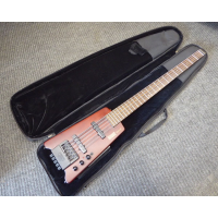 <p>Awesome headless bass guitar in superb aesthetic condition.&nbsp; Includes padded bag.</p><p>Please Note: the active/passive switch doesn't work.&nbsp; A modification has been made in the form of a push/pull pot which&nbsp; allows you to switch between passive and active modes.</p>