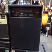 <p>Battered 100 watt bass guitar amplifier.</p><p>Condition: Various rips in the finish and distorts at high volume, hence the low price.</p>