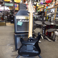 <p>Lovely double cut electric guitar with twin humbucking pickups, slim neck profile and low action.&nbsp; Great for beginners!<br /></p><p>Condition: Lots of marks on the body, unoriginal back plate, plenty of fret wear, missing truss rod cover, unoriginal tremolo arm, hence the low price!</p>