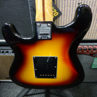 Entry-level sunburst strat in good condition.<br />