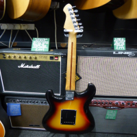 Entry-level sunburst strat in good condition.<br />