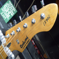 Entry-level sunburst strat in good condition.<br />