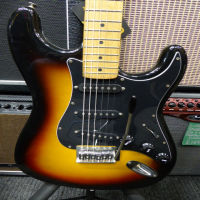 Entry-level sunburst strat in good condition.<br />