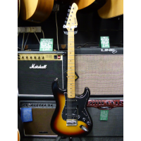 Entry-level sunburst strat in good condition.<br />