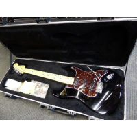 <p>2012 Fender American Standard Stratocaster in near mint condition.&nbsp; There are very fine surface marks that one would expect to see on a black gloss finish compared to any other colour, but otherwise this is like new!</p><p>It has received a stone setup from Andy Warnock and plays like butter!&nbsp; It also has a few upgrades, including Schaller locking machine heads, a set of low noise Lace Sensor Gold pickups, Fender 25db Stratocaster Mid Boost Kit for Eric Clapton Strat installed, and a Fender ultra/deluxe trem bridge with snap-in arm.</p><p>Includes original Fender hard case and manual.</p>