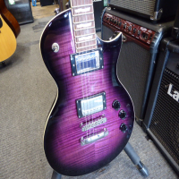 <p>Awesome purple guitar with great tone and playability.</p><p>Excellent condition.</p>
