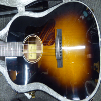 <p>Stunning all-solid dreadnought acoustic guitar with sloped shoulders, ebony fretboard &amp; bridge, sunburst finish, and more.</p><p>Mint condition.</p><p>Inlcudes original hard case.</p>