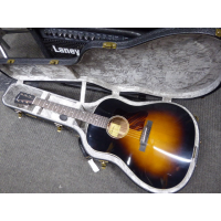 <p>Stunning all-solid dreadnought acoustic guitar with sloped shoulders, ebony fretboard &amp; bridge, sunburst finish, and more.</p><p>Mint condition.</p><p>Inlcudes original hard case.</p>
