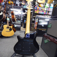 <p>Affordable copy of a Musicman Axis Eddie Van Halen signature guitar with licensed Floyd Rose style trem system.</p><p>Good condition.</p>