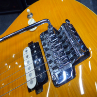 <p>Affordable copy of a Musicman Axis Eddie Van Halen signature guitar with licensed Floyd Rose style trem system.</p><p>Good condition.</p>