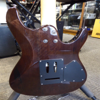 <p>Lovely HSS guitar with quilted maple top and transparent grey finish.&nbsp; Made in Korea (2003/04).</p><p>Condition: A couple of small dents and various pick scrapes and belt-buckle scrapes.</p>