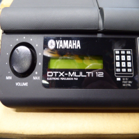 Digital percussion pad in excellent condition with original box, power suppy, and manual.