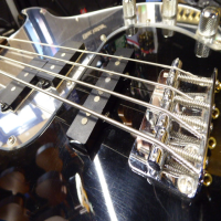 <p>Limited edition PJ bass with black gloss finish, matching headstock, and mirror scratchplate.</p><p>Condition: A few small dents and scrapes.</p>