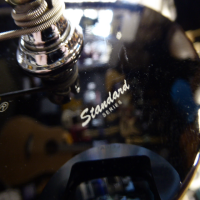 <p>Limited edition PJ bass with black gloss finish, matching headstock, and mirror scratchplate.</p><p>Condition: A few small dents and scrapes.</p>