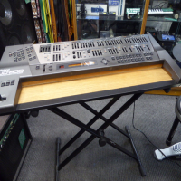<p>Legendary digital synthesizer, released in 1991.</p><p>JD800s are known to suffer from the dreaded 'red glue' issue - the glue used to hold the key weights in place goes runny over time, damaging both the keyboard and the electronics.&nbsp;</p><p>This one's had the keyboard stripped out and all residue of the red glue removed.</p><p>Modded as a custom expander module with wooden shelf. The modification is discrete, with the shelf slotting into the rails where the keyboard assembly would normally go. No holes drilled!<br /><br />Powerful synthesis with over 60 front panel controls.<br />24 voice.<br />Sample-based oscillators and a fully digital signal path.<br />108 built-in waveforms.<br />64 internal patches, each consisting&nbsp; of four 'tones' which can be blended together.<br />Built-in effects include Reverb, Phaser, Distortion and Chorus.<br />Multi mode allows 5 sounds on independent midi channels plus a 'special' patch which allocates different waveforms individual keys for use with drum kits.<br /><br />As a bonus, this unit also comes with the SL-JD80-02 Drums &amp; Percussion Dance PCM and RAM cards.&nbsp;<br />These offer an extra bank of 64 synth sounds on the RAM card and 56 new waveforms on the PCM card, featuring drum samples from the TR-808, TR-909 and CR78 drum machines.<br />Second bonus: an additional M256E RAM card, offering another bank of 64 synth sounds.<br /><br /><br /></p>