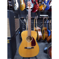 <p>Fender's CF-140S has a smaller "folk" cutaway body shape and liberal string spacing perfect for beginners and flatpickers. Don't let its size fool you though-it projects enough full, rich and resonant acoustic sound to fill a room thanks to its solid spruce top with scalloped quartersawn X bracing. A satin-finish mahogany neck with stabilizing dual-action truss rod makes playing the CF-140S smooth and easy.</p><p>Condition: Various bumps and bruises.&nbsp; A crack in the finish on the table (seen in pics) which is not in the wood.&nbsp; Some dents and marks in the back of the neck.&nbsp; Great action and overall playability.</p>