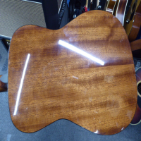<p>Fender's CF-140S has a smaller "folk" cutaway body shape and liberal string spacing perfect for beginners and flatpickers. Don't let its size fool you though-it projects enough full, rich and resonant acoustic sound to fill a room thanks to its solid spruce top with scalloped quartersawn X bracing. A satin-finish mahogany neck with stabilizing dual-action truss rod makes playing the CF-140S smooth and easy.</p><p>Condition: Various bumps and bruises.&nbsp; A crack in the finish on the table (seen in pics) which is not in the wood.&nbsp; Some dents and marks in the back of the neck.&nbsp; Great action and overall playability.</p>