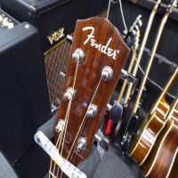 <p>Fender's CF-140S has a smaller "folk" cutaway body shape and liberal string spacing perfect for beginners and flatpickers. Don't let its size fool you though-it projects enough full, rich and resonant acoustic sound to fill a room thanks to its solid spruce top with scalloped quartersawn X bracing. A satin-finish mahogany neck with stabilizing dual-action truss rod makes playing the CF-140S smooth and easy.</p><p>Condition: Various bumps and bruises.&nbsp; A crack in the finish on the table (seen in pics) which is not in the wood.&nbsp; Some dents and marks in the back of the neck.&nbsp; Great action and overall playability.</p>